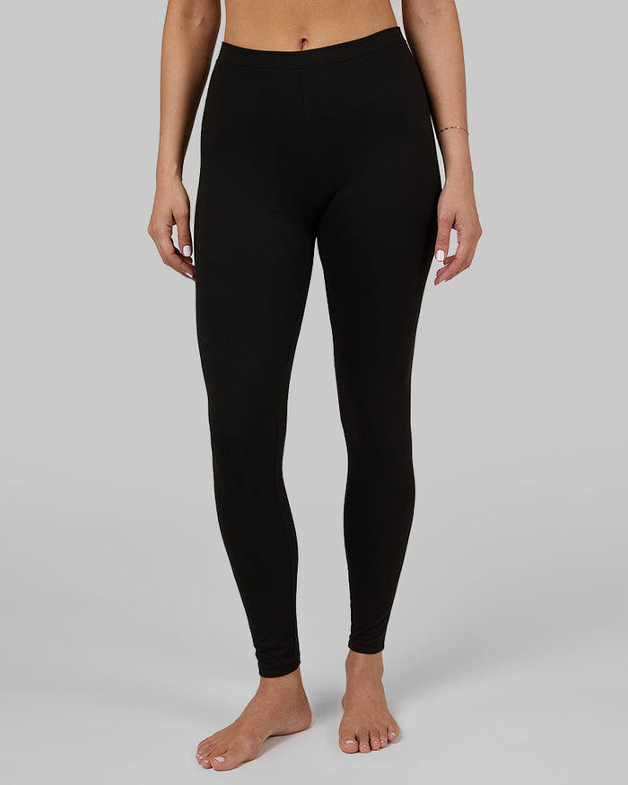 32 Degrees Black _ Women's Lightweight Baselayer Legging {model: Bruna is 5'8", wearing size S}{bottom}{right} {bottom}{right}