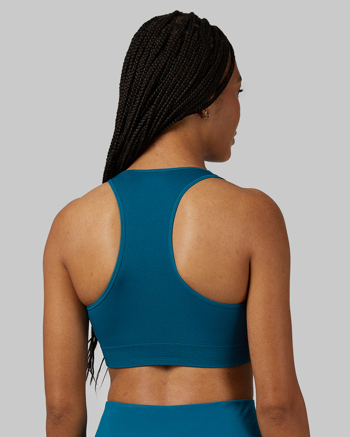 32 Degrees Moroccan Blue _ Women's Seamless Racerback Sports Bra {model: Dido is 5'9"and size 4, wearing size S}{bottom}{right} {bottom}{right}