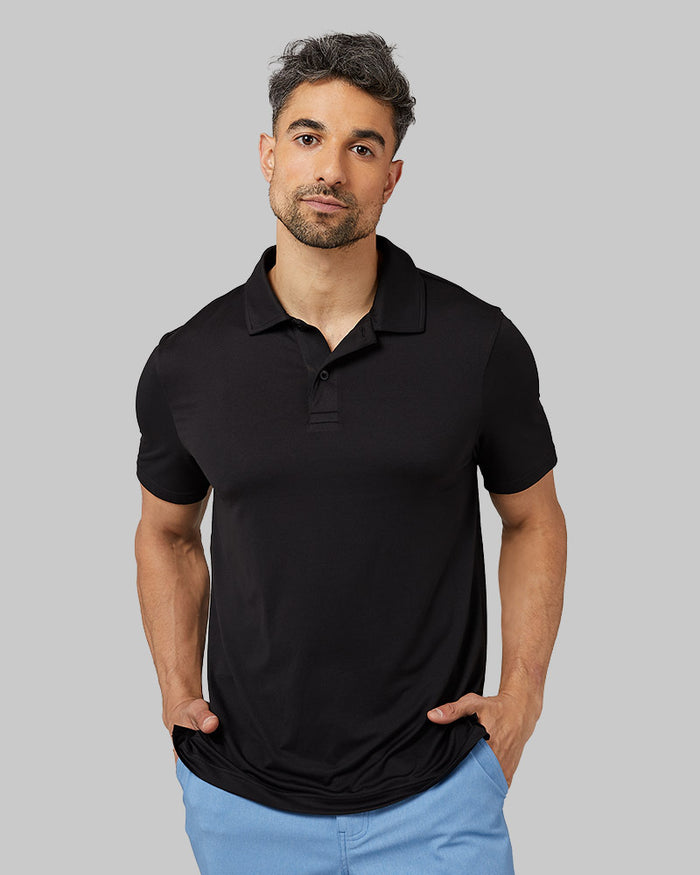 32 Degrees Black _ Men's Cool Classic Polo {model: Daniel is 6'2", wearing size M}{bottom}{right}