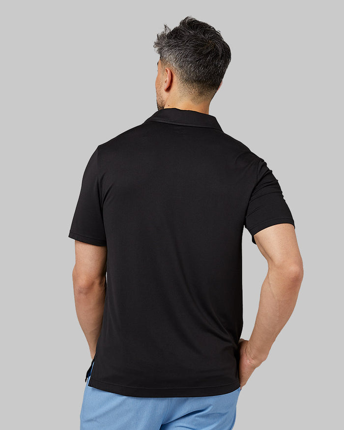 32 Degrees Black _ Men's Cool Classic Polo {model: Daniel is 6'2", wearing size M}{bottom}{right}