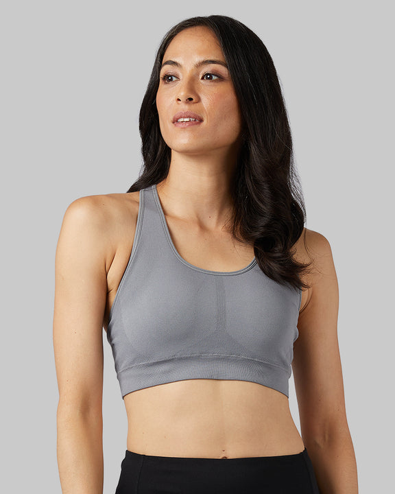 32 Degrees Steel Grey _ Women's Seamless Racerback Sports Bra {model:Mariana is 5'8" and size 4, wearing size S}{bottom}{right}